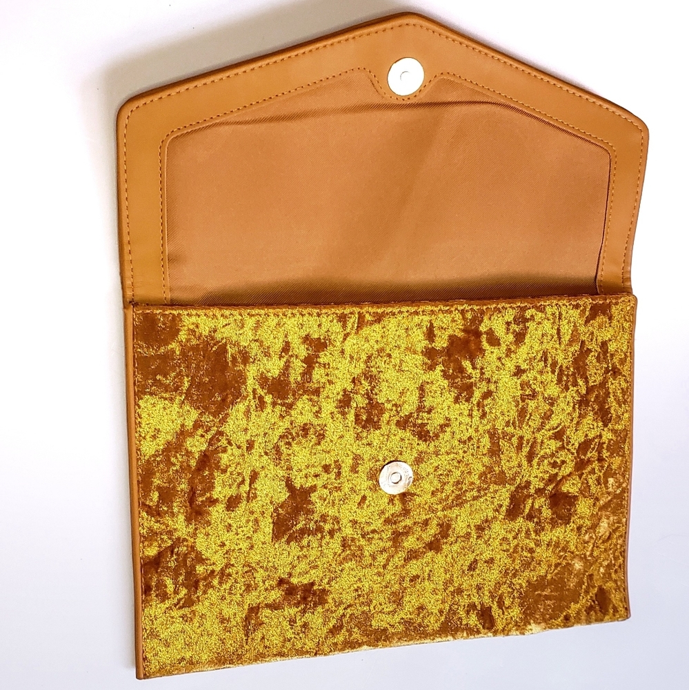 Mustard velvet clutch.